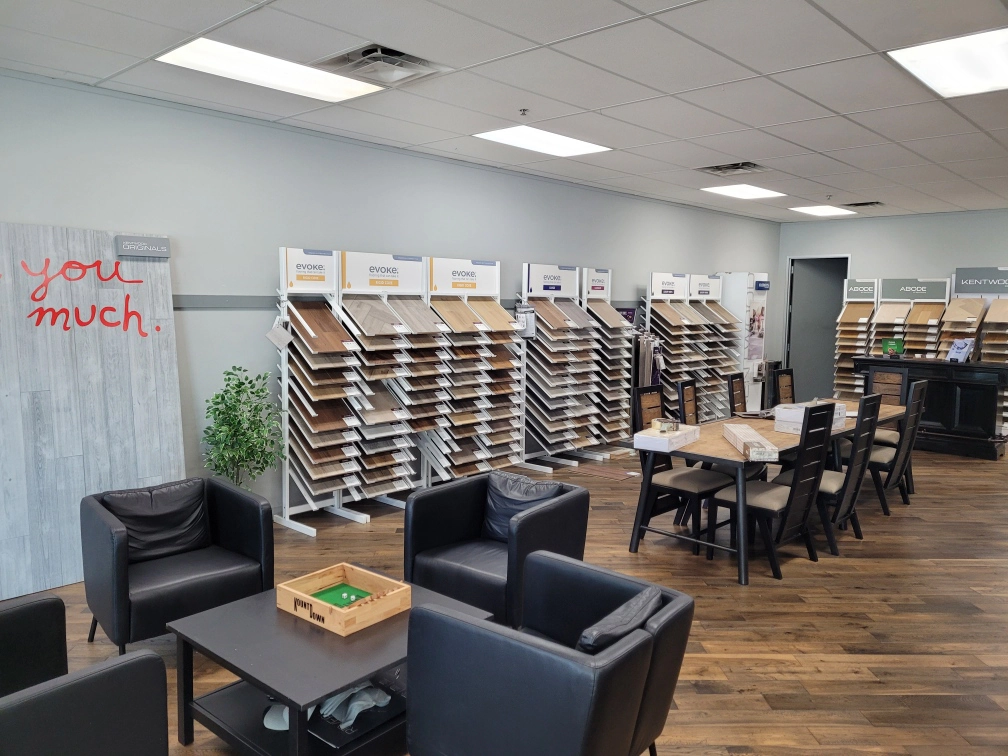 Austin, Texas commercial painting services showroom with seating area, paint sample displays, and design consultation space.